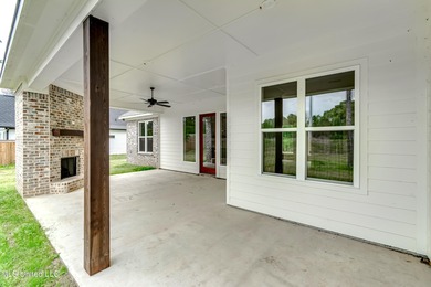 Welcome to 122 Grayson Way in Lake Caroline -- a beautifully on Lake Caroline Golf Club in Mississippi - for sale on GolfHomes.com, golf home, golf lot