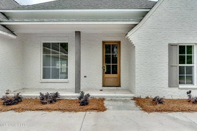 Welcome to 124 Grayson Way -- a beautifully built new on Lake Caroline Golf Club in Mississippi - for sale on GolfHomes.com, golf home, golf lot