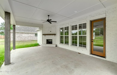 Welcome to 124 Grayson Way -- a beautifully built new on Lake Caroline Golf Club in Mississippi - for sale on GolfHomes.com, golf home, golf lot