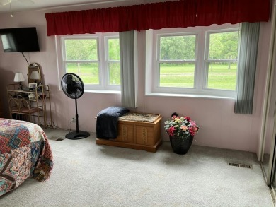 Beautiful and serene 2BR/2BA home with stunning golf course on Fairways Country Club in Florida - for sale on GolfHomes.com, golf home, golf lot