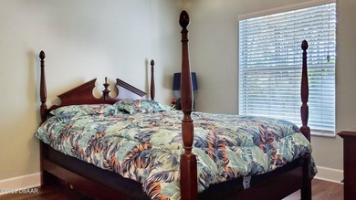 Welcome to your private Florida retreat! This spacious 4-bedroom on Plantation Bay Golf and Country Club in Florida - for sale on GolfHomes.com, golf home, golf lot