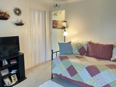 Beautiful and serene 2BR/2BA home with stunning golf course on Fairways Country Club in Florida - for sale on GolfHomes.com, golf home, golf lot