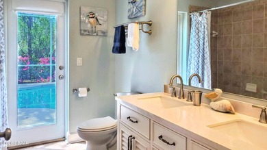 Welcome to your private Florida retreat! This spacious 4-bedroom on Plantation Bay Golf and Country Club in Florida - for sale on GolfHomes.com, golf home, golf lot