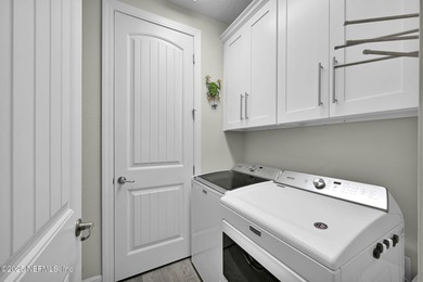 Situated on a quiet cul-de-sac street in the coveted community on The Palencia Club in Florida - for sale on GolfHomes.com, golf home, golf lot