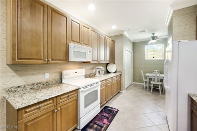 Welcome to this stylish and spacious second-floor carriage home on Gateway Golf and Country Club in Florida - for sale on GolfHomes.com, golf home, golf lot