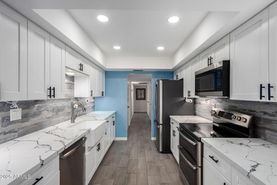 Welcome home to this beautifully remodeled 2-bedroom residence on Union Hills Country Club in Arizona - for sale on GolfHomes.com, golf home, golf lot