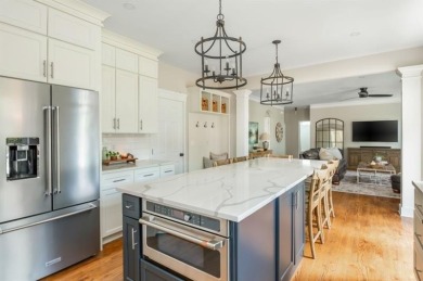 Tucked in a quiet cul-de-sac, this beautifully updated 5 bedroom on Windermere Golf Club in Georgia - for sale on GolfHomes.com, golf home, golf lot