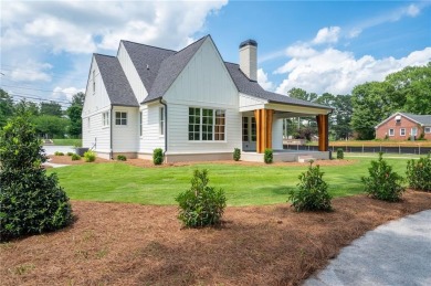 Welcome to this stunning custom-built residence nestled in the on Sunset Hills Country Club in Georgia - for sale on GolfHomes.com, golf home, golf lot