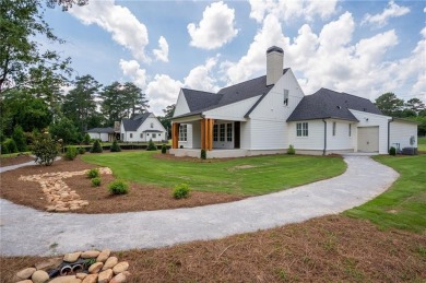 Welcome to this stunning custom-built residence nestled in the on Sunset Hills Country Club in Georgia - for sale on GolfHomes.com, golf home, golf lot