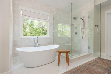 Tucked in a quiet cul-de-sac, this beautifully updated 5 bedroom on Windermere Golf Club in Georgia - for sale on GolfHomes.com, golf home, golf lot