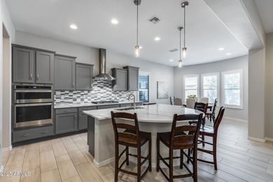 PRICED BELOW MARKET - MOVE-IN READY WITH OVER $73K IN BUILDER on Poston Butte Golf Club in Arizona - for sale on GolfHomes.com, golf home, golf lot