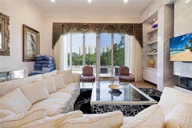 This exceptional 3-bedroom plus den, 3.5-bathroom estate home in on West Bay Beach and Golf Club in Florida - for sale on GolfHomes.com, golf home, golf lot
