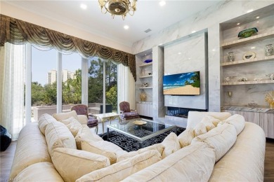 This exceptional 3-bedroom plus den, 3.5-bathroom estate home in on West Bay Beach and Golf Club in Florida - for sale on GolfHomes.com, golf home, golf lot