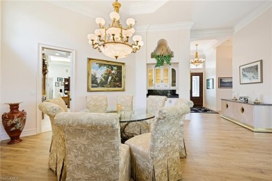 This exceptional 3-bedroom plus den, 3.5-bathroom estate home in on West Bay Beach and Golf Club in Florida - for sale on GolfHomes.com, golf home, golf lot