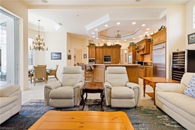 This exceptional 3-bedroom plus den, 3.5-bathroom estate home in on West Bay Beach and Golf Club in Florida - for sale on GolfHomes.com, golf home, golf lot