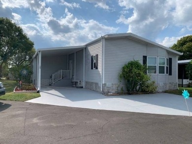 PRICE REDUCTION!  The home sustained damage to the lanai roof on The Meadows At Countrywood in Florida - for sale on GolfHomes.com, golf home, golf lot