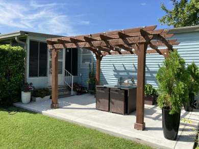 Beautifully remodeled 3BR/2BA home in a vibrant 55+ active on Fairways Country Club in Florida - for sale on GolfHomes.com, golf home, golf lot