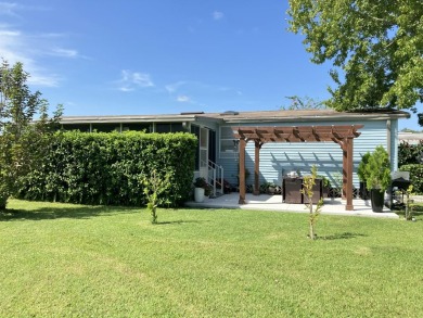 Beautifully remodeled 3BR/2BA home in a vibrant 55+ active on Fairways Country Club in Florida - for sale on GolfHomes.com, golf home, golf lot