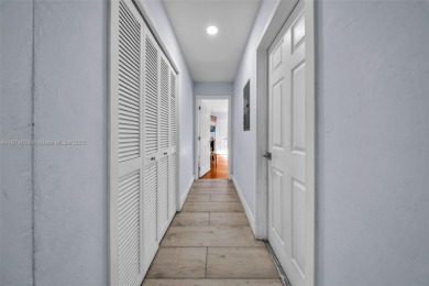 Welcome to 9480 Palmetto Club Ln E--an updated 4-bed, 2-bath on Palmetto Golf Course in Florida - for sale on GolfHomes.com, golf home, golf lot