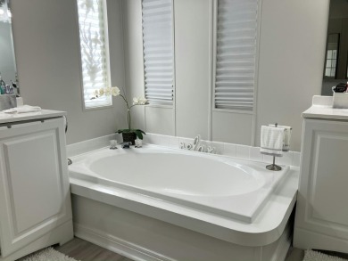 Beautifully remodeled 3BR/2BA home in a vibrant 55+ active on Fairways Country Club in Florida - for sale on GolfHomes.com, golf home, golf lot
