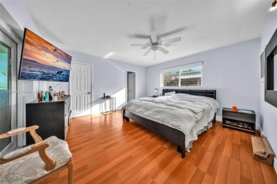 Welcome to 9480 Palmetto Club Ln E--an updated 4-bed, 2-bath on Palmetto Golf Course in Florida - for sale on GolfHomes.com, golf home, golf lot