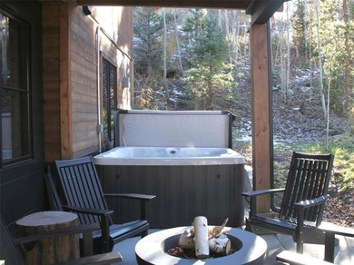 Discover modern mountain living in this stunning 4-bed, 4-bath on Raven Golf Club At Three Peaks in Colorado - for sale on GolfHomes.com, golf home, golf lot
