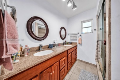 Welcome to 9480 Palmetto Club Ln E--an updated 4-bed, 2-bath on Palmetto Golf Course in Florida - for sale on GolfHomes.com, golf home, golf lot