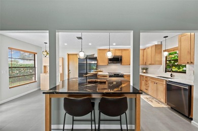 From the moment you arrive, this beautifully renovated modern on IMG Academies Golf and Country Club in Florida - for sale on GolfHomes.com, golf home, golf lot