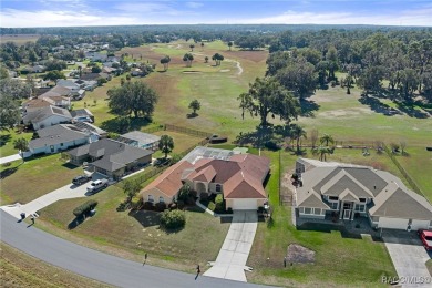 This immaculate home is located on the 5th hole at the Lakeside on LakeSide Country Club in Florida - for sale on GolfHomes.com, golf home, golf lot