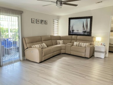 Beautifully remodeled 3BR/2BA home in a vibrant 55+ active on Fairways Country Club in Florida - for sale on GolfHomes.com, golf home, golf lot