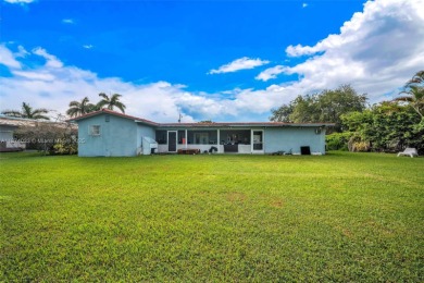 Welcome to 9480 Palmetto Club Ln E--an updated 4-bed, 2-bath on Palmetto Golf Course in Florida - for sale on GolfHomes.com, golf home, golf lot