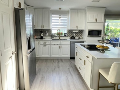 Beautifully remodeled 3BR/2BA home in a vibrant 55+ active on Fairways Country Club in Florida - for sale on GolfHomes.com, golf home, golf lot