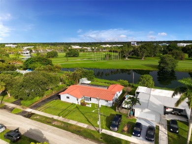 Welcome to 9480 Palmetto Club Ln E--an updated 4-bed, 2-bath on Palmetto Golf Course in Florida - for sale on GolfHomes.com, golf home, golf lot