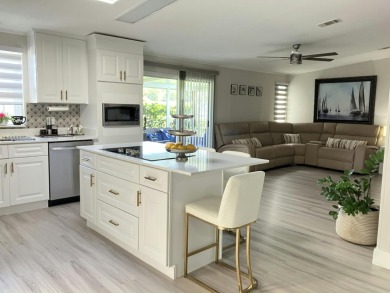 Beautifully remodeled 3BR/2BA home in a vibrant 55+ active on Fairways Country Club in Florida - for sale on GolfHomes.com, golf home, golf lot