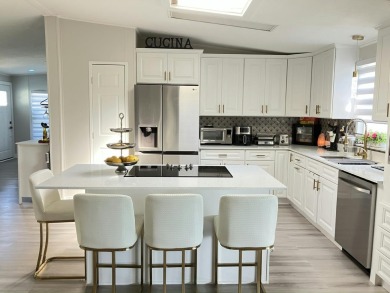 Beautifully remodeled 3BR/2BA home in a vibrant 55+ active on Fairways Country Club in Florida - for sale on GolfHomes.com, golf home, golf lot