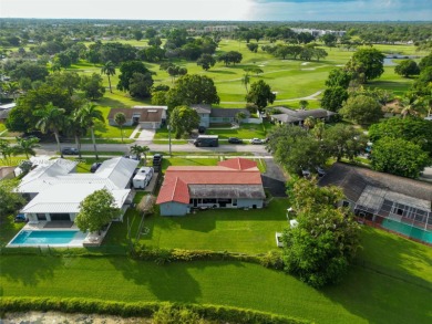 Welcome to 9480 Palmetto Club Ln E--an updated 4-bed, 2-bath on Palmetto Golf Course in Florida - for sale on GolfHomes.com, golf home, golf lot