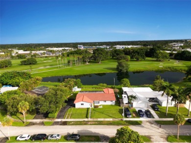 Welcome to 9480 Palmetto Club Ln E--an updated 4-bed, 2-bath on Palmetto Golf Course in Florida - for sale on GolfHomes.com, golf home, golf lot