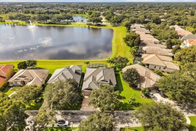 Welcome to this stunning lakefront home in the gated golf on Heathrow Country Club in Florida - for sale on GolfHomes.com, golf home, golf lot