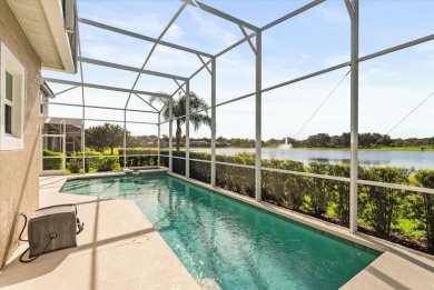 Welcome to this stunning lakefront home in the gated golf on Heathrow Country Club in Florida - for sale on GolfHomes.com, golf home, golf lot