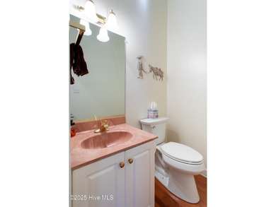 Beautiful, well-maintained, custom-built, brick home in the on Sound Golf Links at Albemarle Plantation in North Carolina - for sale on GolfHomes.com, golf home, golf lot