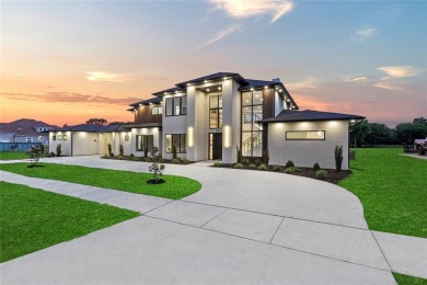 Nestled on a manicured 1-acre lot overlooking the golf course on Tangle Ridge Golf Club in Texas - for sale on GolfHomes.com, golf home, golf lot