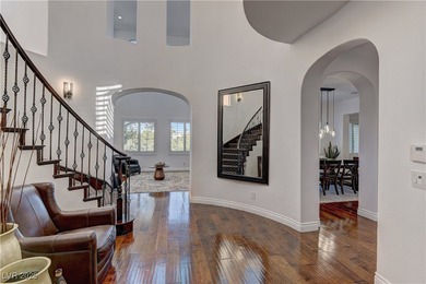 A stunning six-bedroom residence in Red Rock, this home welcomes on Red Rock Country Club in Nevada - for sale on GolfHomes.com, golf home, golf lot