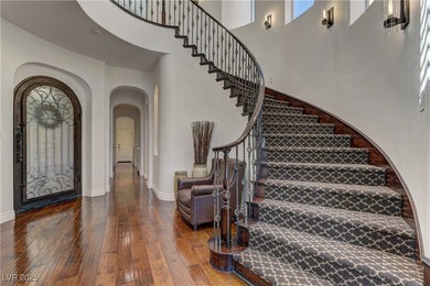 A stunning six-bedroom residence in Red Rock, this home welcomes on Red Rock Country Club in Nevada - for sale on GolfHomes.com, golf home, golf lot