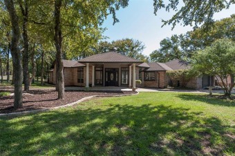A wonderfully updated DCBE gem on the 5th tee box of the Durant on De Cordova Bend Country Club in Texas - for sale on GolfHomes.com, golf home, golf lot