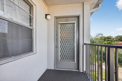 Beautifully Maintained Corner Unit in New Hampton at Century on Flamingo Lakes Country Club in Florida - for sale on GolfHomes.com, golf home, golf lot