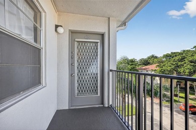 Beautifully Maintained Corner Unit in New Hampton at Century on Flamingo Lakes Country Club in Florida - for sale on GolfHomes.com, golf home, golf lot