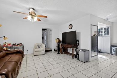 Beautifully Maintained Corner Unit in New Hampton at Century on Flamingo Lakes Country Club in Florida - for sale on GolfHomes.com, golf home, golf lot