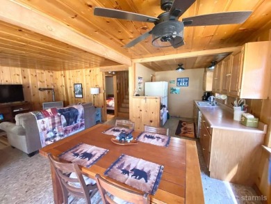 You really need to come see this adorable rustic cabin in a on Bijou Golf Course in California - for sale on GolfHomes.com, golf home, golf lot