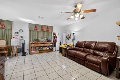 Beautifully Maintained Corner Unit in New Hampton at Century on Flamingo Lakes Country Club in Florida - for sale on GolfHomes.com, golf home, golf lot
