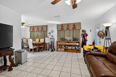 Beautifully Maintained Corner Unit in New Hampton at Century on Flamingo Lakes Country Club in Florida - for sale on GolfHomes.com, golf home, golf lot